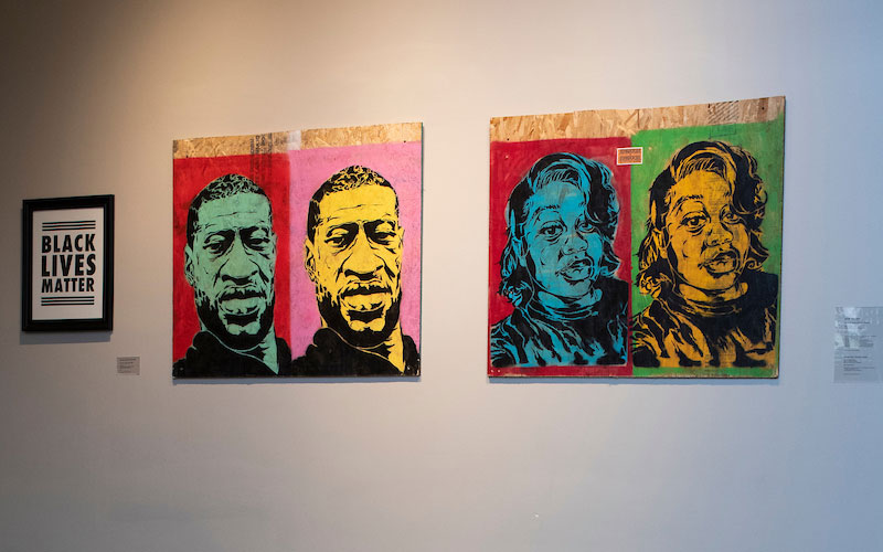 vibrant stencil and spray paint on plywood double portraits of George Floyd and Breonna Taylor