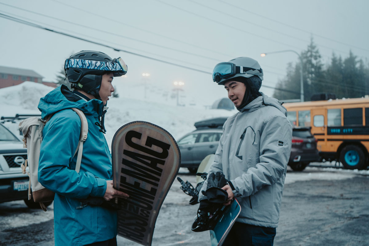 Seattle University students snowboarding at Snoqualmie Pass.